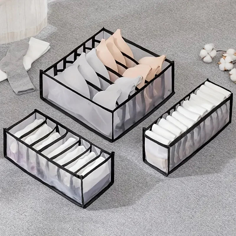 Grey mesh drawer organisers holding bras and socks
